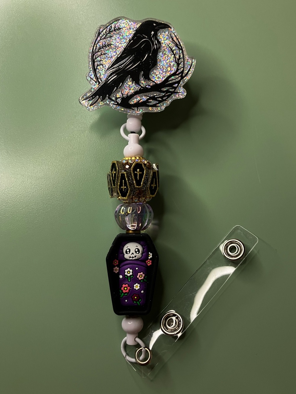 Raven Silver Sparkle Badge Reel with Coffin Beads • Handmade Halloween Work Gift